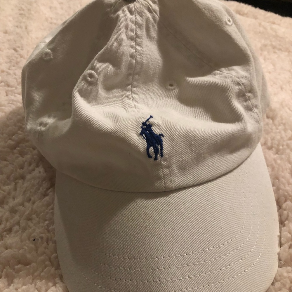 1 White Polo Hat and 1 “Yeezy for President” Hat.